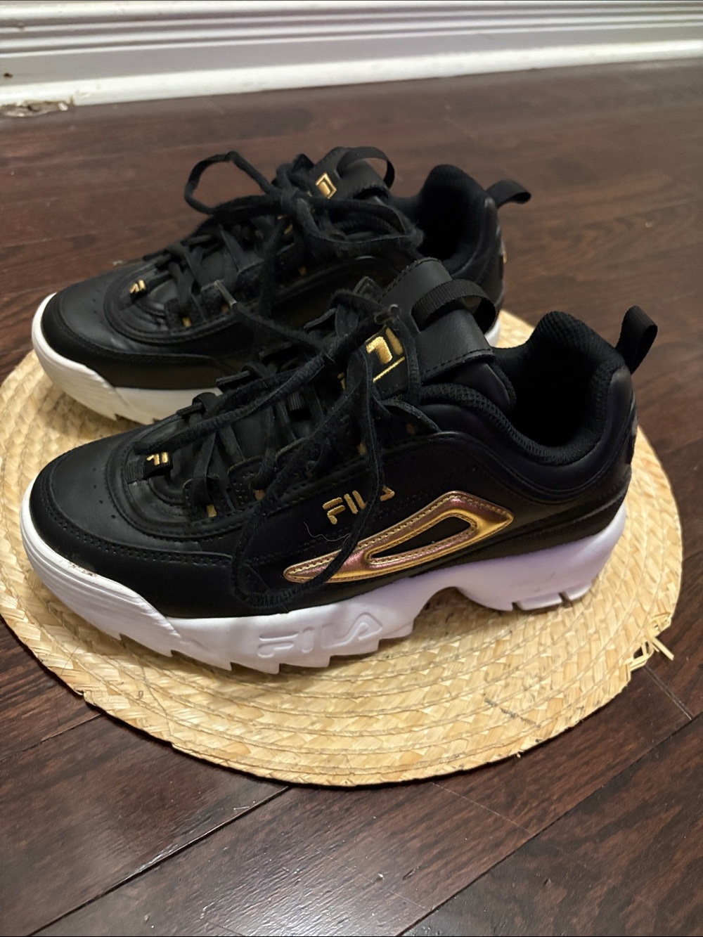 Fila Black Sneakers with Gold Accent and White Platform